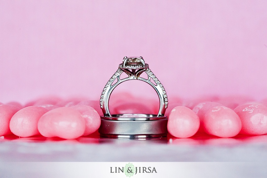 Wedding rings on vibrant textured fabric background showcasing color and detail