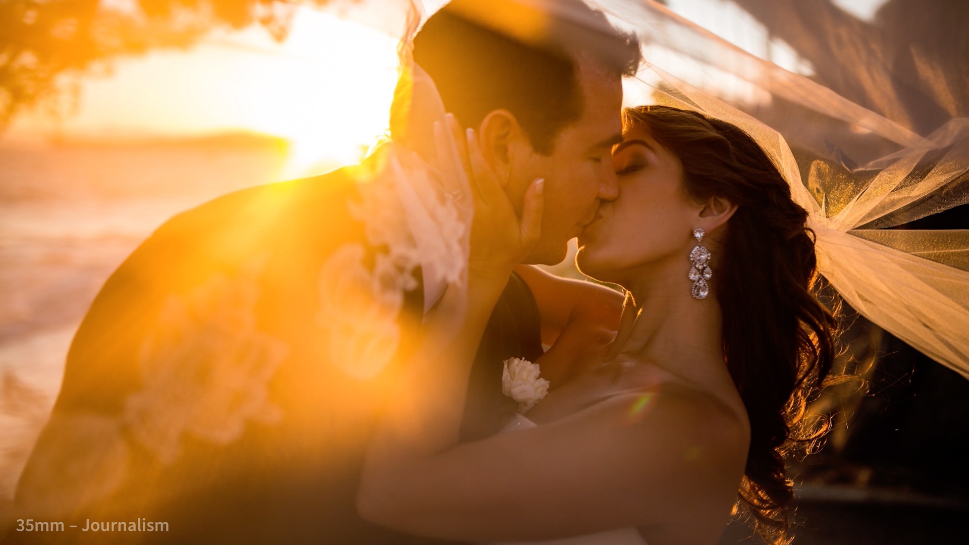 Portrait photograph showing light blooming and circular flare at a wide open aperture of f/2 on a 35mm lens