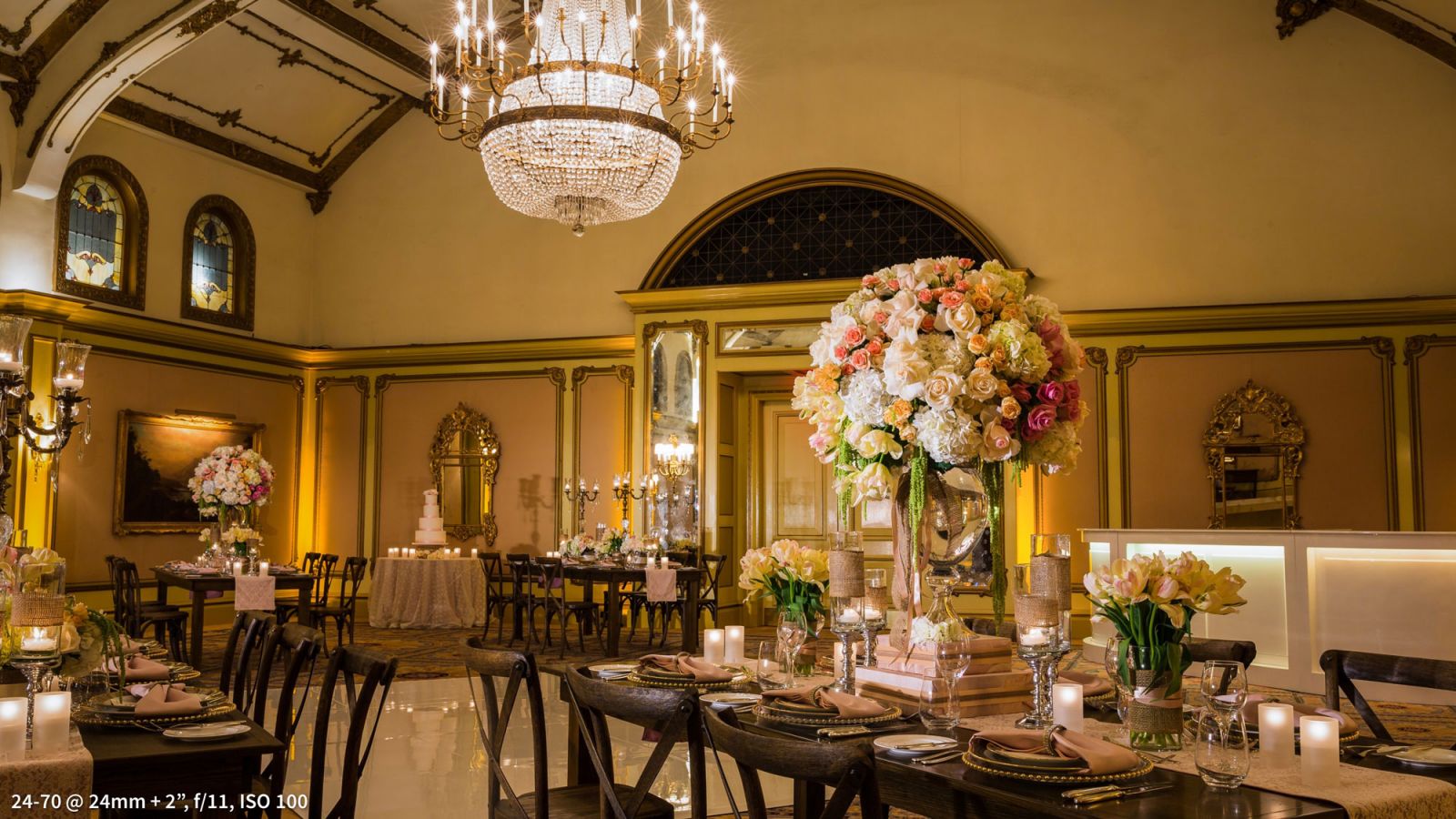 Wedding reception detail shots showing table settings, centerpieces, and place cards photographed before guests arrive with wide medium and tight approach