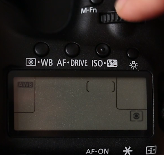 Canon 5D Mark III top LCD showing Evaluative metering mode icon selected in the bottom right corner of the display